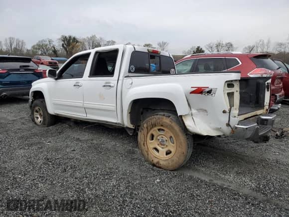 2011 Chevrolet Colorado 2LT z VIN 1GCHTDFEXB8131039, wystawiony jako Copart lot #49612975 z przebiegiem 188 034 mil mil oraz Szkoda całkowita • Salvage title. Historia ofert i sprzedaży dostępna na DreamBid. Obrazek 2.