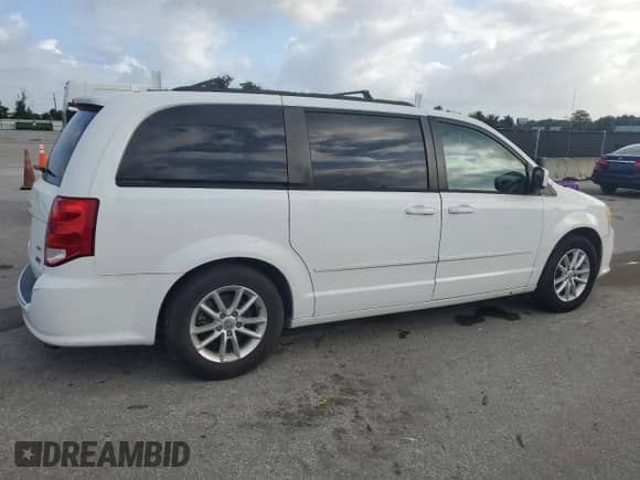 2014 Dodge Grand Caravan SXT z VIN 2C4RDGCG3ER155717, wystawiony jako Copart lot #85822865 z przebiegiem 158 656 mil mil oraz Czysty tytuł • Clean title. Historia ofert i sprzedaży dostępna na DreamBid. Obrazek 3.