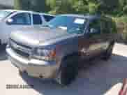 2012 Chevrolet Tahoe LT with VIN 1GNSCBE04CR161804, listed as a IAAI auction lot 43311334 with 242,513 mi miles and . Bid and sale history available at DreamBid. Image 2.