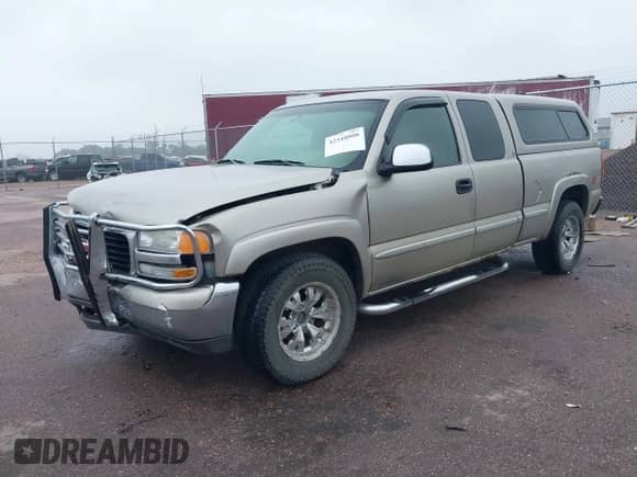 2002 GMC Sierra 1500 SLE z VIN 2GTEK19TX21147176, wystawiony jako IAAI lot #42548008 z przebiegiem 308 911 mil mil oraz . Historia ofert i sprzedaży dostępna na DreamBid. Obrazek 18.