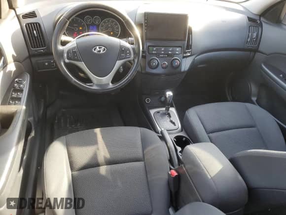 2009 Hyundai Elantra Touring with VIN KMHDC86E09U038792, listed as a Copart auction lot 84791125 with 172,061 mi miles and Salvage title. Bid and sale history available at DreamBid. Image 8.