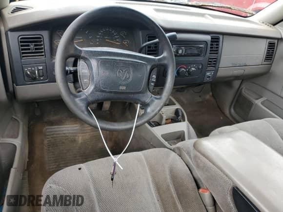 2001 Dodge Dakota with VIN 1B7FL26X61S248969, listed as a Copart auction lot 54474475 with 232,889 mi miles and Non repairable. Bid and sale history available at DreamBid. Image 8.