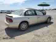 1998 Saturn SL with VIN 1G8ZK5272WZ276073, listed as a Copart auction lot 69880235 with 147,663 mi miles and Salvage title. Bid and sale history available at DreamBid. Image 3.