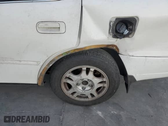 1995 Toyota Camry XLE с VIN JT2GK13E8S0123840, выставлен на аукционе Copart как лот 86379784 с пробегом 276 387 миль миль и Списание • Salvage title. История ставок и продаж доступна на DreamBid. Изображение 10.