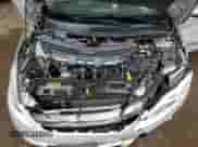 2011 Ford Fiesta SE z VIN 3FADP4BJ1BM207366, wystawiony jako Copart lot #83856805 z przebiegiem 169 433 mil mil oraz Szkoda całkowita • Salvage title. Historia ofert i sprzedaży dostępna na DreamBid. Obrazek 11.