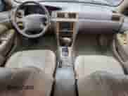 1997 Toyota Camry LE with VIN 4T1BG22KXVU821763, listed as a Copart auction lot 71875345 with 205,057 mi miles and Salvage title. Bid and sale history available at DreamBid. Image 8.