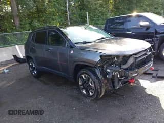 2018 Jeep Compass Trailhawk z VIN 3C4NJDDB8JT343455, wystawiony jako IAAI lot #42545545 z przebiegiem 90 515 mil mil oraz . Historia ofert i sprzedaży dostępna na DreamBid. Obrazek 1.
