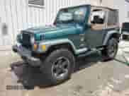 2000 Jeep Wrangler SE with VIN 1J4FA29P2YP800721, listed as a Copart auction lot 67490145 with 128,182 mi miles and Clean title. Bid and sale history available at DreamBid. Image 1.