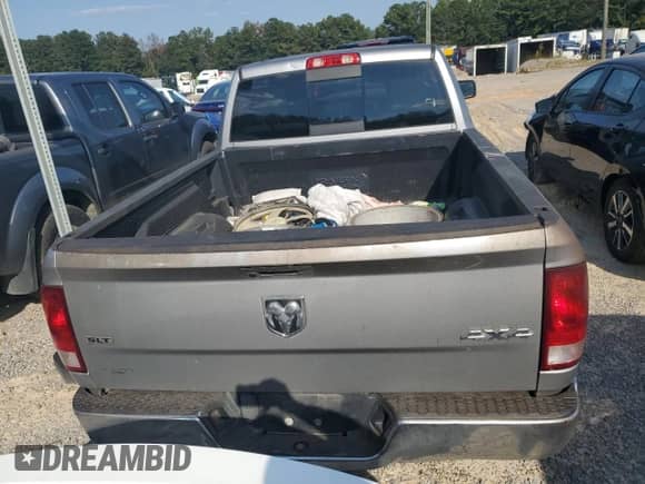 2020 Ram 1500 SLT z VIN 1C6RR7TT7LS101628, wystawiony jako Copart lot #70119135 z przebiegiem 162 538 mil mil oraz Czysty tytuł • Clean title. Historia ofert i sprzedaży dostępna na DreamBid. Obrazek 6.