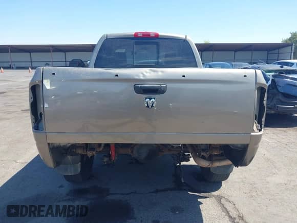 2006 Dodge 1500 SLT z VIN 1D7HU18236S628902, wystawiony jako IAAI lot #43155885 z przebiegiem Nie podano mil oraz . Historia ofert i sprzedaży dostępna na DreamBid. Obrazek 16.