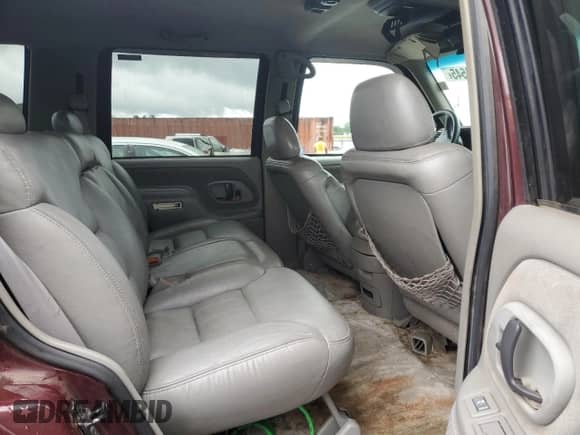 1995 Chevrolet Tahoe with VIN 1GNEK13K9SJ451466, listed as a Copart auction lot 59164545 with 165,537 mi miles and Salvage title. Bid and sale history available at DreamBid. Image 11.