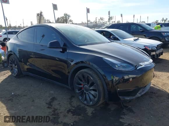 2022 Tesla Model Y Performance with VIN 7SAYGDEF7NF516418, listed as a IAAI auction lot 43222998 with 26,525 mi miles and . Bid and sale history available at DreamBid. Image 1.