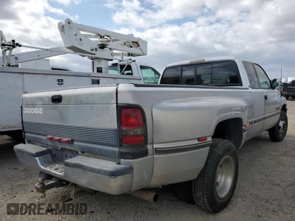1997 Dodge RAM with VIN 3B7MC33W4VM536948, listed as a Copart auction lot 53741055 with 151,754 mi miles and Salvage title. Bid and sale history available at DreamBid. Image 3.