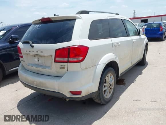 2017 Dodge Journey SXT with VIN 3C4PDCBG4HT590992, listed as a IAAI auction lot 42378549 with 275,884 mi miles and . Bid and sale history available at DreamBid. Image 4.