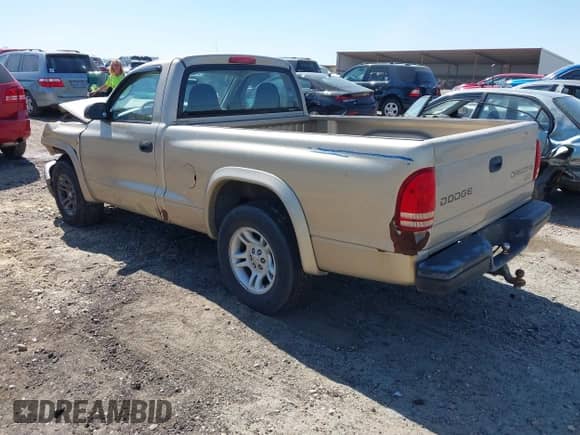 2003 Dodge Dakota z VIN 1D7FL16X13S358492, wystawiony jako IAAI lot #41903051 z przebiegiem 151 162 mil mil oraz . Historia ofert i sprzedaży dostępna na DreamBid. Obrazek 3.