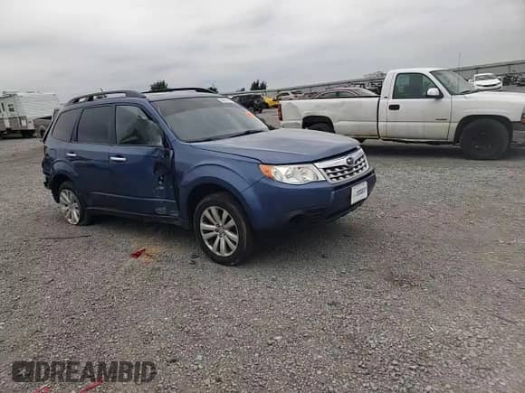 2012 Subaru Forester X Premium с VIN JF2SHBDC3CH447317, выставлен на аукционе Copart как лот 58572385 с пробегом 151 676 миль миль и Списание • Salvage title. История ставок и продаж доступна на DreamBid. Изображение 12.
