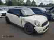 2013 MINI Hardtop with VIN WMWSU3C51DT374477, listed as a Copart auction lot 62654295 with 127,295 mi miles and Salvage title. Bid and sale history available at DreamBid. Image 4.