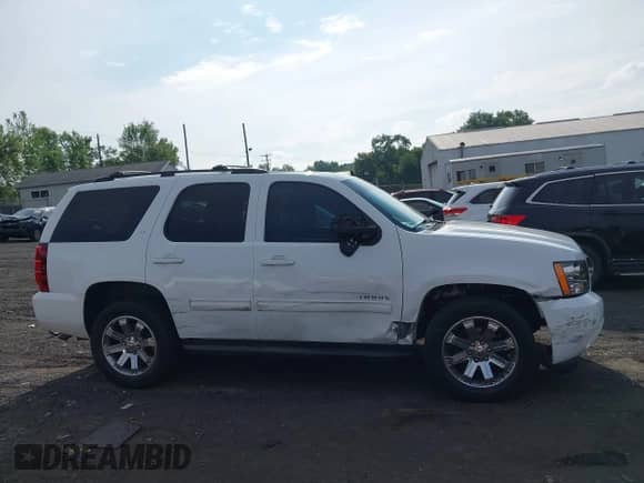 2011 Chevrolet Tahoe LT with VIN 1GNSKBE05BR135228, listed as a IAAI auction lot 42695981 with 106,281 mi miles and . Bid and sale history available at DreamBid. Image 13.