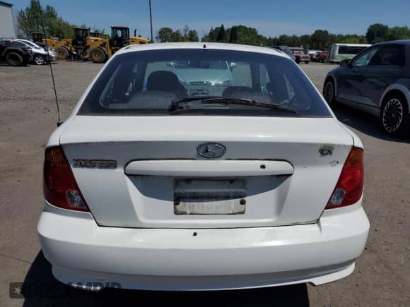 2005 Hyundai Accent GLS с VIN KMHCG35C75U353506, выставлен на аукционе Copart как лот 63022545 с пробегом 143 246 миль миль и Списание • Salvage title. История ставок и продаж доступна на DreamBid. Изображение 6.