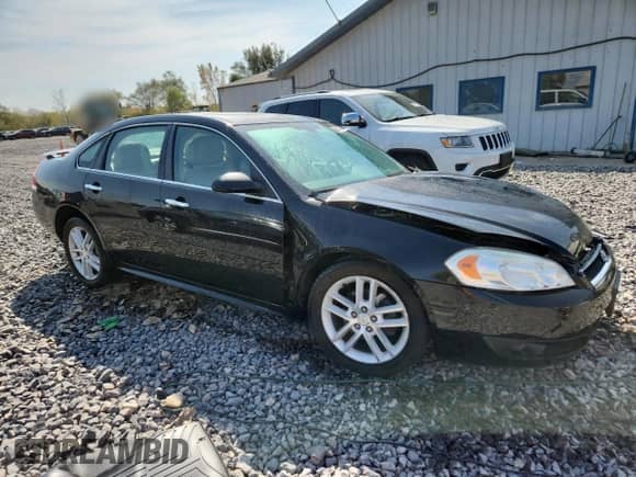 2012 Chevrolet Impala LTZ with VIN 2G1WC5E38C1106506, listed as a Copart auction lot 80847175 with 116,801 mi miles and Salvage title. Bid and sale history available at DreamBid. Image 4.