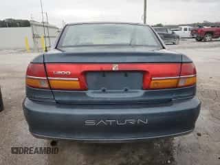 2002 Saturn LS with VIN 1G8JU54F72Y581967, listed as a Copart auction lot 74521994 with 215,018 mi miles and Salvage title. Bid and sale history available at DreamBid. Image 6.