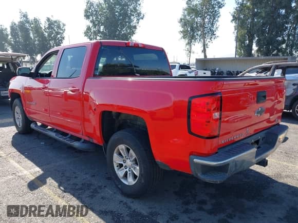 2018 Chevrolet Silverado 1500 LT z VIN 3GCPCREC9JG584585, wystawiony jako IAAI lot #43156300 z przebiegiem 129 083 mil mil oraz . Historia ofert i sprzedaży dostępna na DreamBid. Obrazek 3.