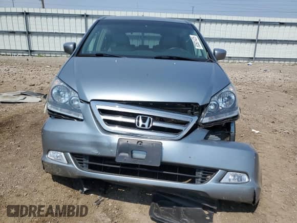 2006 Honda Odyssey Touring z VIN 5FNRL38826B023655, wystawiony jako Copart lot #60501425 z przebiegiem 76 615 mil mil oraz Szkoda całkowita • Salvage title. Historia ofert i sprzedaży dostępna na DreamBid. Obrazek 5.