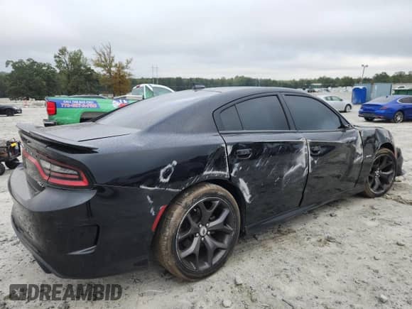 2019 Dodge Charger R/T z VIN 2C3CDXCT9KH584465, wystawiony jako Copart lot #85082275 z przebiegiem 60 493 mil mil oraz Szkoda całkowita • Salvage title. Historia ofert i sprzedaży dostępna na DreamBid. Obrazek 3.