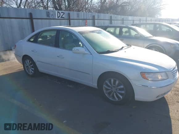 2007 Hyundai Azera SE z VIN KMHFC46F37A177646, wystawiony jako IAAI lot #41347297 z przebiegiem 154 000 mil mil oraz . Historia ofert i sprzedaży dostępna na DreamBid. Obrazek 1.