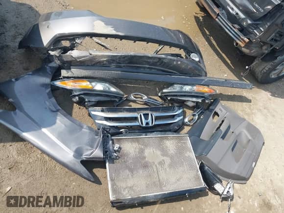 2016 Honda Odyssey Touring Elite z VIN 5FNRL5H97GB034558, wystawiony jako IAAI lot #42862918 z przebiegiem 118 891 mil mil oraz . Historia ofert i sprzedaży dostępna na DreamBid. Obrazek 12.