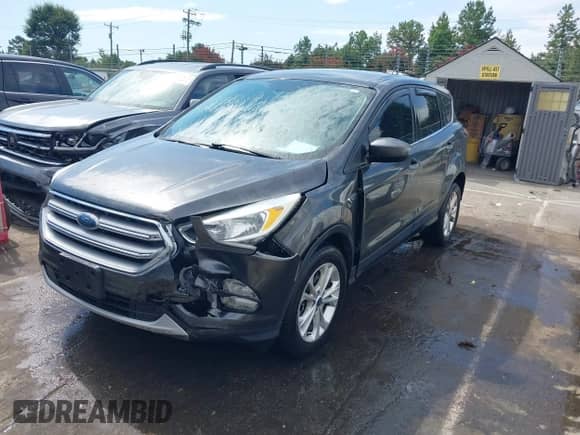2017 Ford Escape SE with VIN 1FMCU9G93HUC52514, listed as a IAAI auction lot 43133799 with 141,616 mi miles and . Bid and sale history available at DreamBid. Image 17.