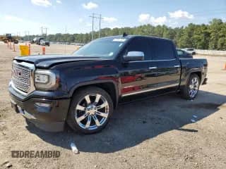 2018 GMC Sierra 1500 Denali z VIN 3GTU2PEJ7JG511238, wystawiony jako Copart lot #81005185 z przebiegiem 133 463 mil mil oraz Szkoda całkowita • Salvage title. Historia ofert i sprzedaży dostępna na DreamBid. Obrazek 1.