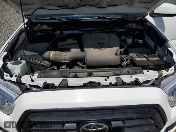 2022 Toyota Tacoma SR z VIN 3TMCZ5AN2NM522935, wystawiony jako Copart lot #69641735 z przebiegiem 89 840 mil mil oraz Szkoda całkowita • Salvage title. Historia ofert i sprzedaży dostępna na DreamBid. Obrazek 11.