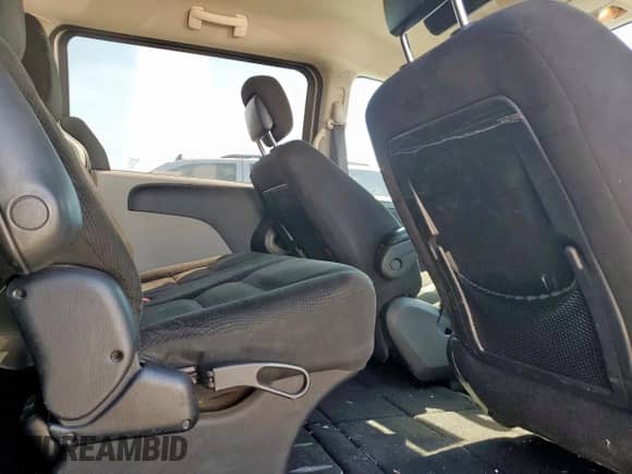 2015 Dodge Grand Caravan American Value z VIN 2C4RDGBG9FR737601, wystawiony jako Copart lot #85888315 z przebiegiem 170 666 mil mil oraz Szkoda całkowita • Salvage title. Historia ofert i sprzedaży dostępna na DreamBid. Obrazek 11.