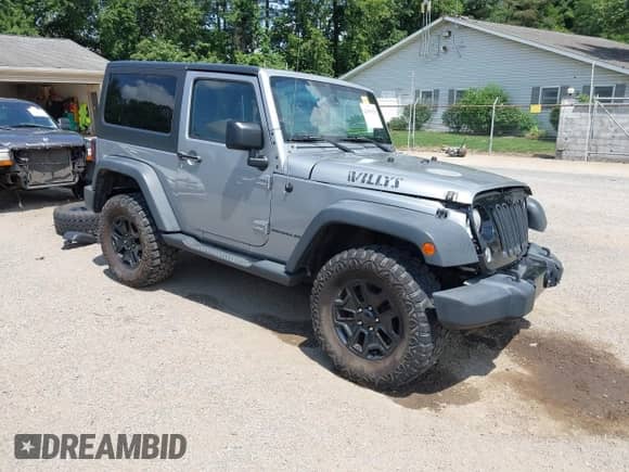 2015 Jeep Wrangler Sport with VIN 1C4AJWAG2FL507778, listed as a IAAI auction lot 42665428 with 126,554 mi miles and . Bid and sale history available at DreamBid. Image 1.