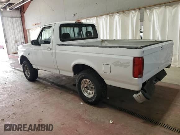1995 Ford F-150 with VIN 1FTEF14N4SNA51085, listed as a Copart auction lot 60658455 with 157,713 mi miles and Salvage title. Bid and sale history available at DreamBid. Image 2.