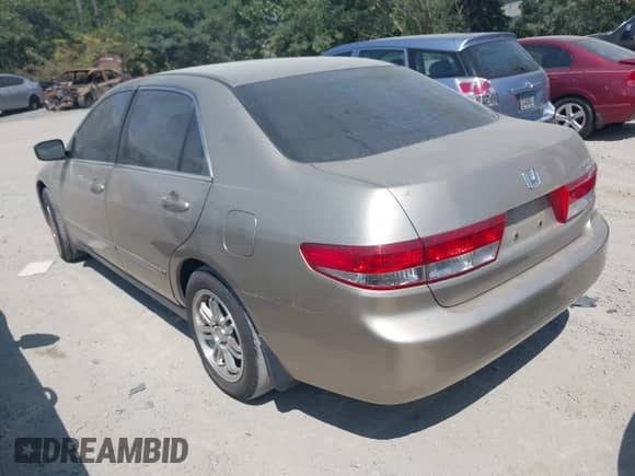 2003 Honda Accord LX with VIN 1HGCM55363A079370, listed as a IAAI auction lot 43053060 with 244,462 mi miles and . Bid and sale history available at DreamBid. Image 3.