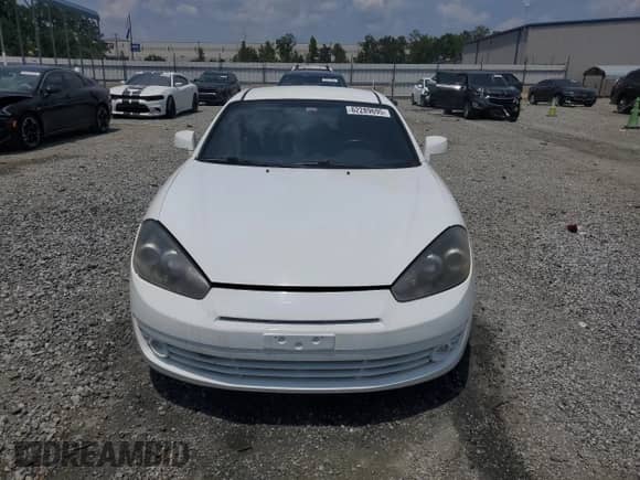 2007 Hyundai Tiburon GT с VIN KMHHN66F17U252700, выставлен на аукционе Copart как лот 62289695 с пробегом 96 467 миль миль и Списание • Salvage title. История ставок и продаж доступна на DreamBid. Изображение 5.