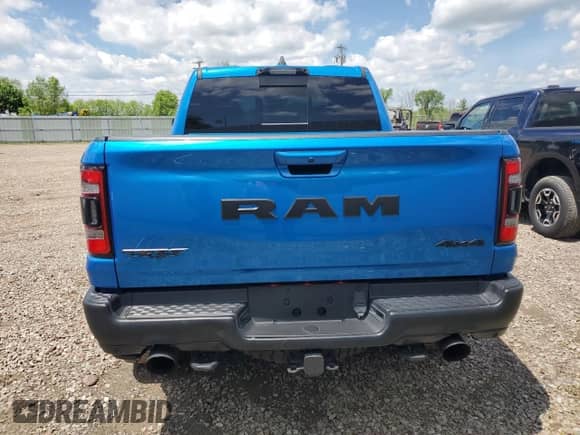 2022 Ram 1500 TRX с VIN 1C6SRFU93NN229879, выставлен на аукционе Copart как лот 58710335 с пробегом 8 047 миль миль и Списание • Salvage title. История ставок и продаж доступна на DreamBid. Изображение 6.