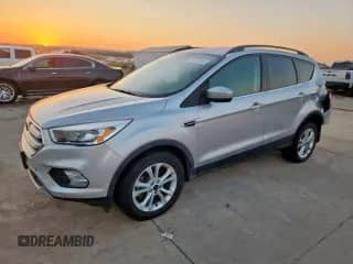 2018 Ford Escape SE с VIN 1FMCU9GD0JUB93710, выставлен на аукционе Copart как лот 85751065 с пробегом 138 902 миль миль и Списание • Salvage title. История ставок и продаж доступна на DreamBid. Изображение 1.