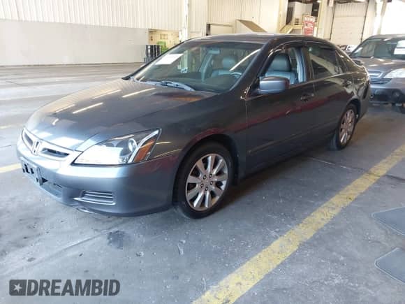 2006 Honda Accord EX-L with VIN 1HGCM66526A007057, listed as a IAAI auction lot 43130889 with 218,563 mi miles and . Bid and sale history available at DreamBid. Image 2.