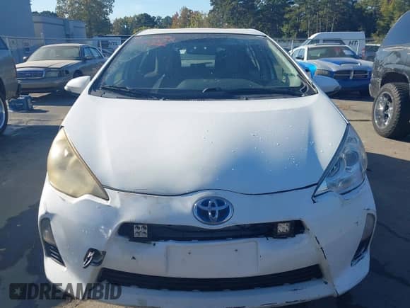 2014 Toyota Prius One with VIN JTDKDTB33E1066758, listed as a IAAI auction lot 43533544 with 104,950 mi miles and . Bid and sale history available at DreamBid. Image 12.