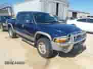 2003 Dodge Dakota SLT с VIN 1D7HG48N23S200916, выставлен на аукционе IAAI как лот 41672271 с пробегом 193 552 миль миль и . История ставок и продаж доступна на DreamBid. Изображение 1.