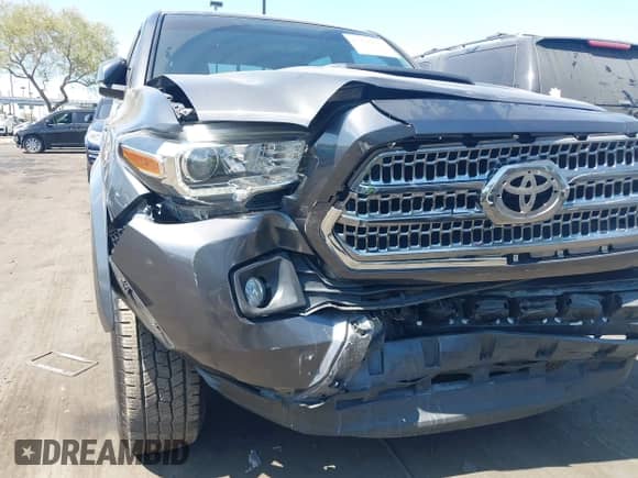 2016 Toyota Tacoma SR5 with VIN 3TMAZ5CNXGM009360, listed as a IAAI auction lot 43186084 with 89,490 mi miles and . Bid and sale history available at DreamBid. Image 6.