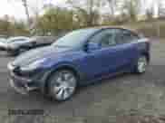 2020 Tesla Model Y Long Range z VIN 5YJYGDEE9LF046944, wystawiony jako Copart lot #89550215 z przebiegiem 48 154 mil mil oraz Szkoda całkowita • Salvage title. Historia ofert i sprzedaży dostępna na DreamBid. Obrazek 1.