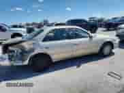 2000 Toyota Camry LE z VIN JT2BG22K7Y0467127, wystawiony jako Copart lot #84280225 z przebiegiem 118 606 mil mil oraz Szkoda całkowita • Salvage title. Historia ofert i sprzedaży dostępna na DreamBid. Obrazek 3.