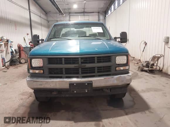 1998 Chevrolet Silverado 1500 z VIN 1GCEK19R9WE194708, wystawiony jako IAAI lot #42548241 z przebiegiem 197 471 mil mil oraz . Historia ofert i sprzedaży dostępna na DreamBid. Obrazek 13.