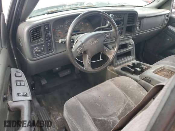 2005 GMC Sierra 1500 SLT z VIN 2GTEK19BX51360902, wystawiony jako Copart lot #59135085 z przebiegiem 198 803 mil mil oraz Czysty tytuł • Clean title. Historia ofert i sprzedaży dostępna na DreamBid. Obrazek 8.
