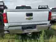 2016 Chevrolet Silverado 2500HD Work Truck z VIN 1GC2KUE85GZ175858, wystawiony jako Copart lot #64756145 z przebiegiem 135 621 mil mil oraz Szkoda całkowita • Salvage title. Historia ofert i sprzedaży dostępna na DreamBid. Obrazek 6.