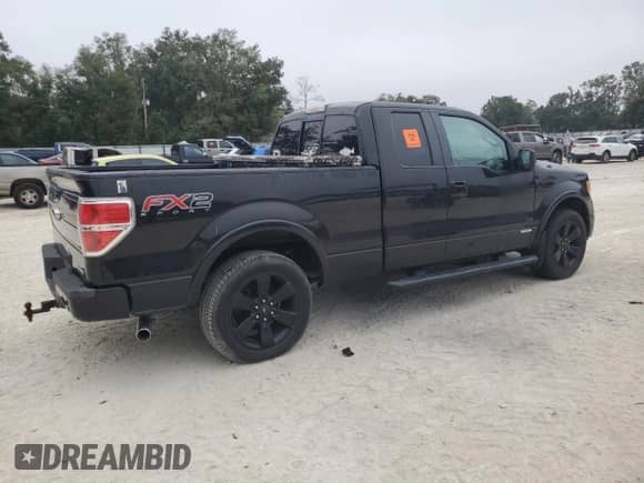 2012 Ford F-150 XL z VIN 1FTFX1CT2CFC70480, wystawiony jako Copart lot #74603364 z przebiegiem Nie podano mil oraz Szkoda całkowita • Salvage title. Historia ofert i sprzedaży dostępna na DreamBid. Obrazek 3.